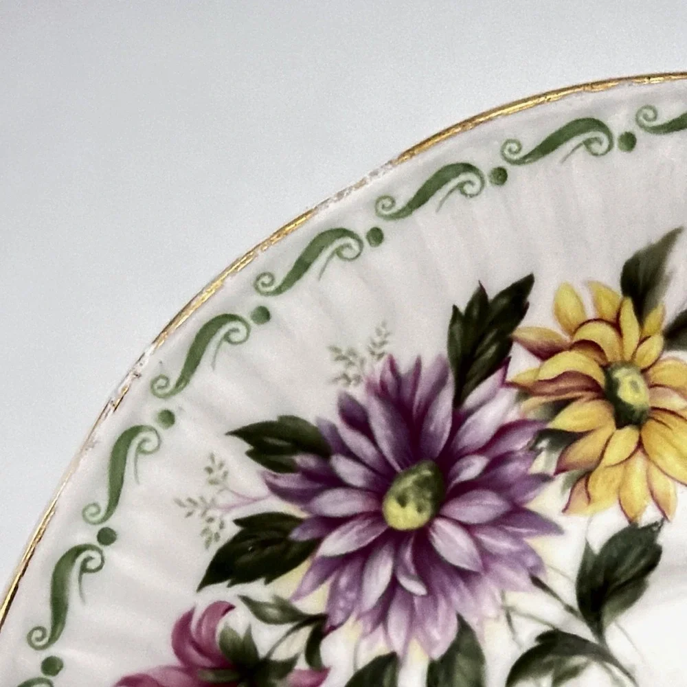 Vintage Queen's Rosina Wild Flowers fine bone china Tea cup with matching saucer